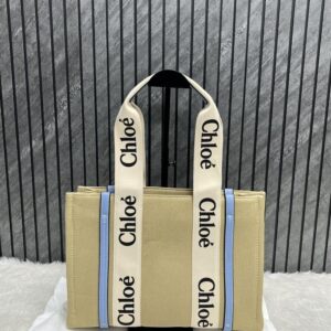 chloe blue medium canvas woody tote with dust cover blue