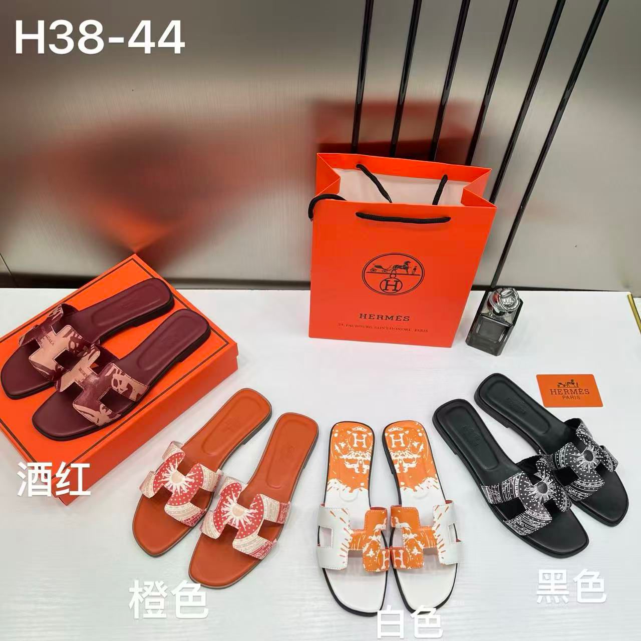 hermes paris oran flats for her with og box & carry bag h38 44 white orange slide hermes paris oran flats for her with og box & carry bag h38 44 white orange slide
