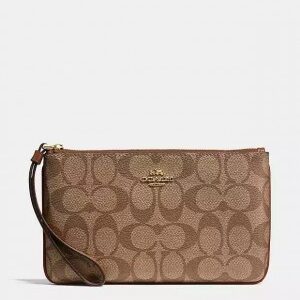 coach corner zip wristlet in signature canvas with brown with og box & dust bag 102