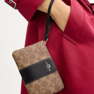 coach corner zip wristlet in signature canvas with black stripe with og box & dust bag 105