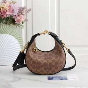 coach small jonie 22 half moon leather shoulder bag in signature apricot black 2088