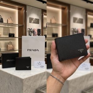 prad a mens wallet with box and carry bag(p 912))