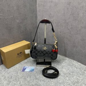 coacch nolita 19 black with cherry charm in signature canvas presbyopia black with og box & dust cover 3digit 9923 black