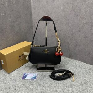 coacch nolita 19 black with cherry charm in signature canvas black with og box & dust cover black 9923