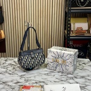 christian key oblique small bag with og box 1162