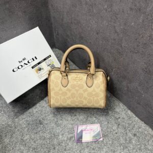coacch mini rowan crossbody signature apricot with og box & dust cover apricot